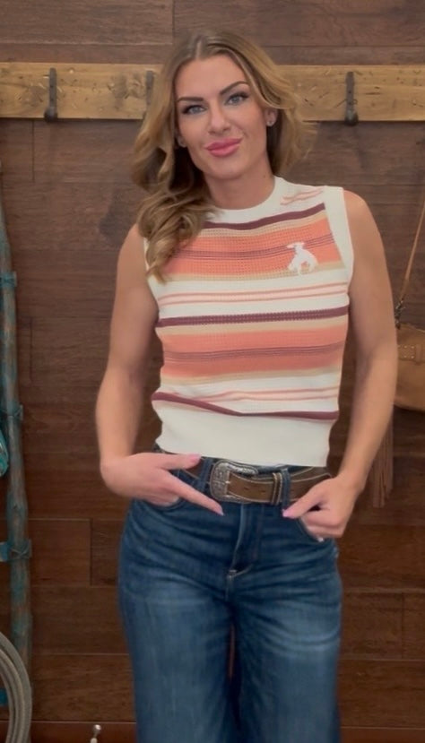 Woman wearing a striped sleeveless top 