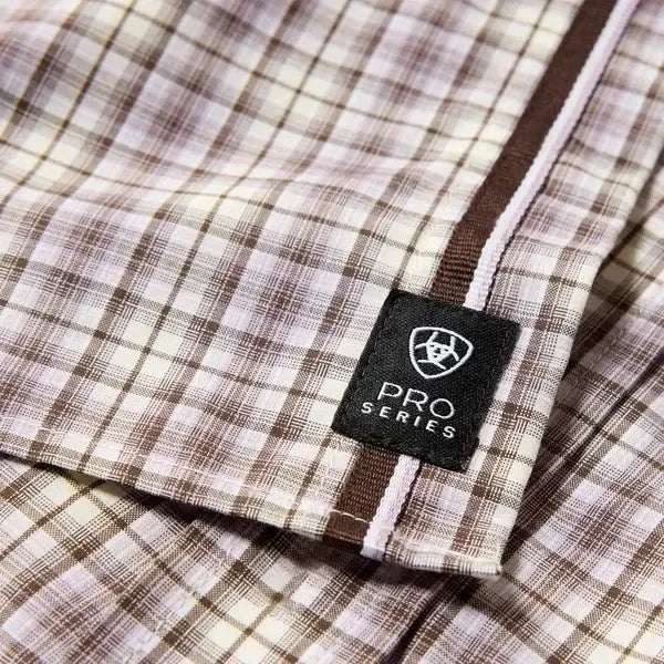 Close-up of a plaid shirt with a 'Pro Series' label.