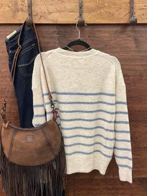 A cream and blue striped knit sweater 