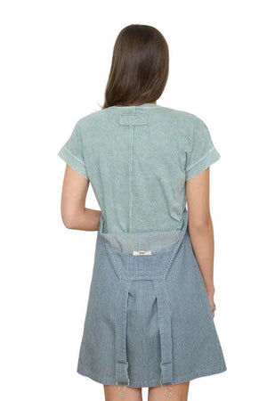 Woman wearing a light green top 