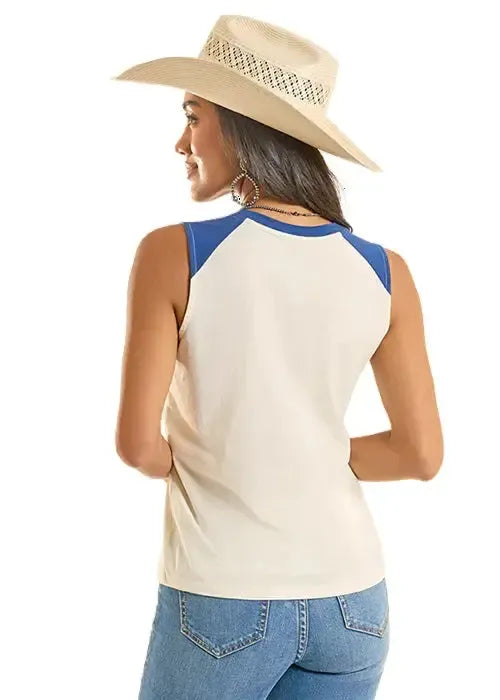 Woman wearing a beige and blue sleeveless top with a wide-brimmed hat on a white background