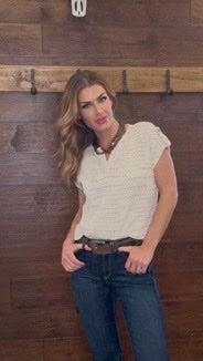 Woman wearing a white top 
