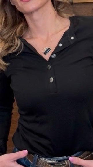 Versatile black long-sleeve shirt with a quarter button-down. 