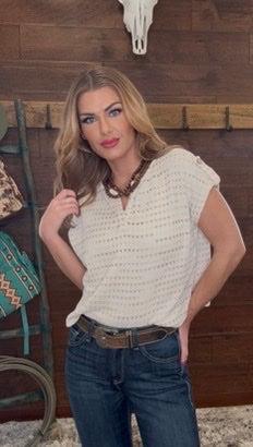 Woman wearing a white top 