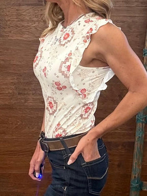  Southwestern-style floral print tank top features a cream-colored base with a delicate ruffle edge. 