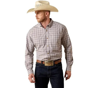 Man wearing a plaid shirt, jeans, and a cowboy hat on a white background
