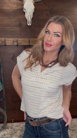 Woman wearing a white top 