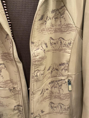 A tan zip-front jacket with a subtle horse-and-rider print. 