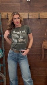 Woman wearing a t-shirt with 'The Rodeo 1998' design