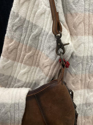 Cream, grey and beige horizontally striped knit sweater