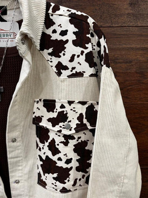 Corduroy shirt jacket with cowprint. 