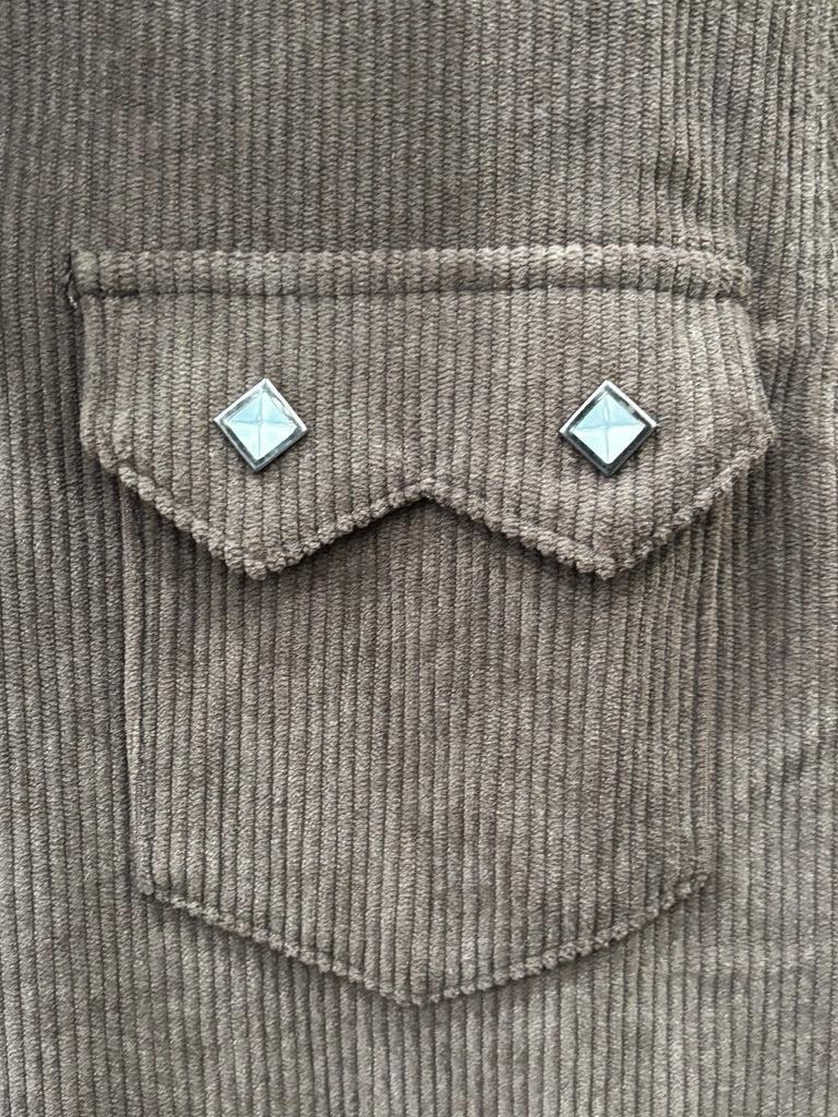 Dark brown western-style button-down shirt with silver studs and chest pockets, 
