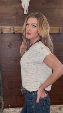 Woman wearing a white top 