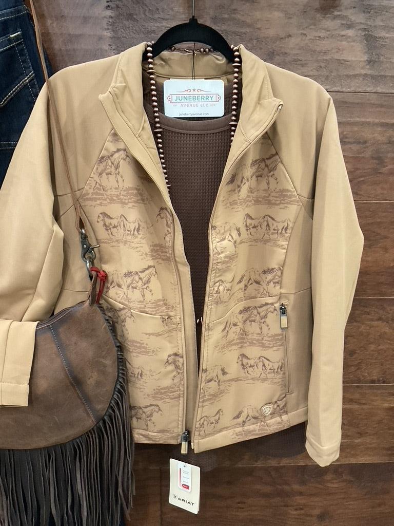 A tan zip-front jacket with a subtle horse-and-rider print. 