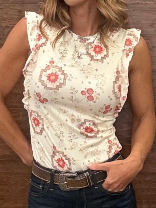  Southwestern-style floral print tank top features a cream-colored base with a delicate ruffle edge. 