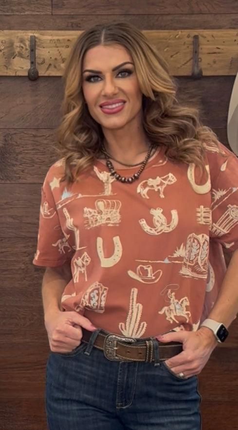 Woman wearing a patterned shirt with a wooden background