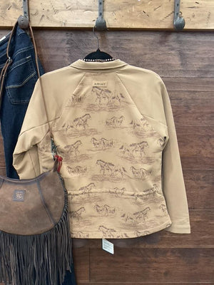 A tan zip-front jacket with a subtle horse-and-rider print. 
