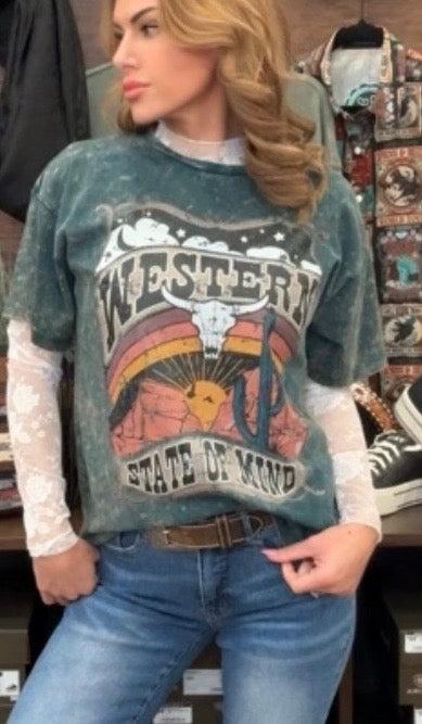 Person wearing a graphic t-shirt with text and design