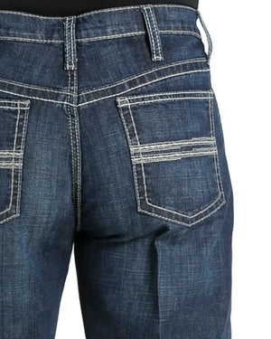 Close-up of blue jeans with a white background