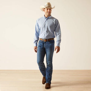 Man wearing a light blue button-up shirt