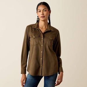 A woman modeling aolive green long-sleeve button-up shirt with two chest pockets. 