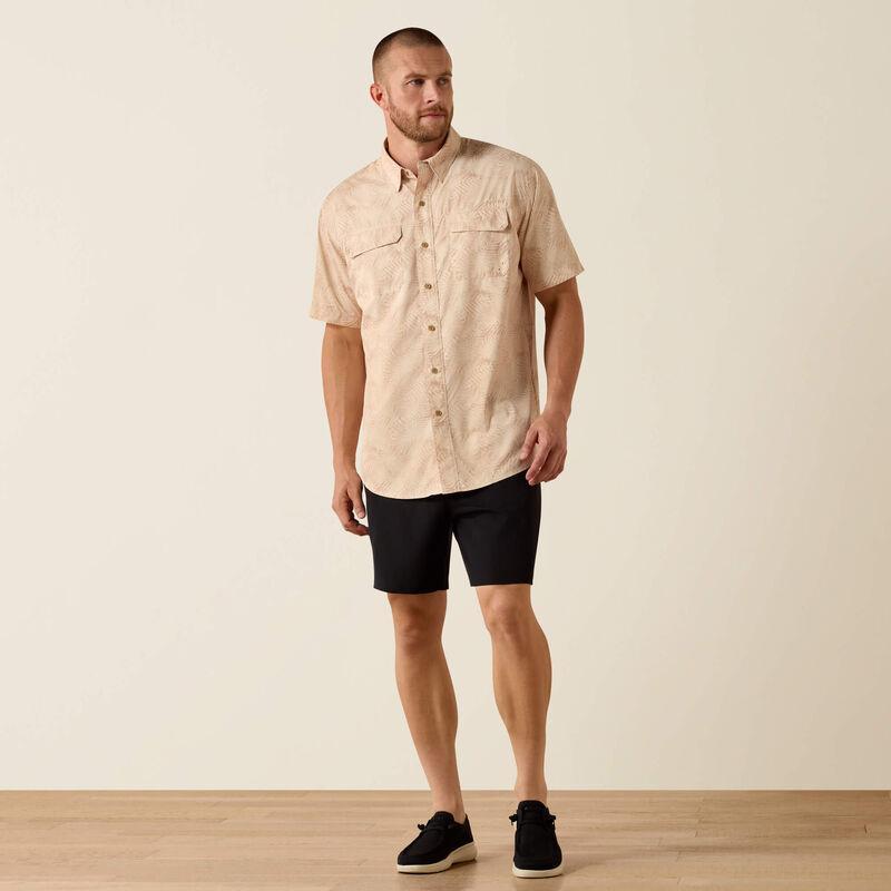 Short sleeve button down beige patterned shirt.