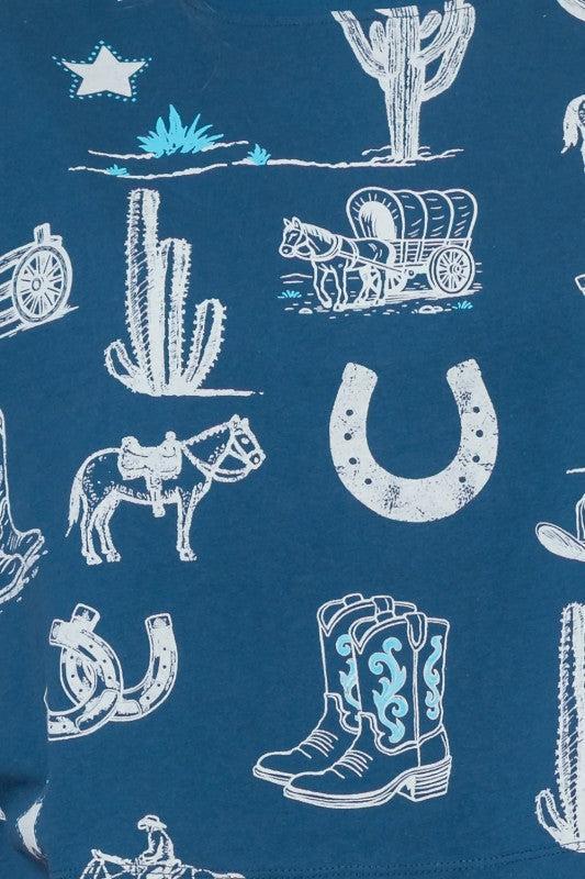 Woman wearing a blue t-shirt with white graphic designs 