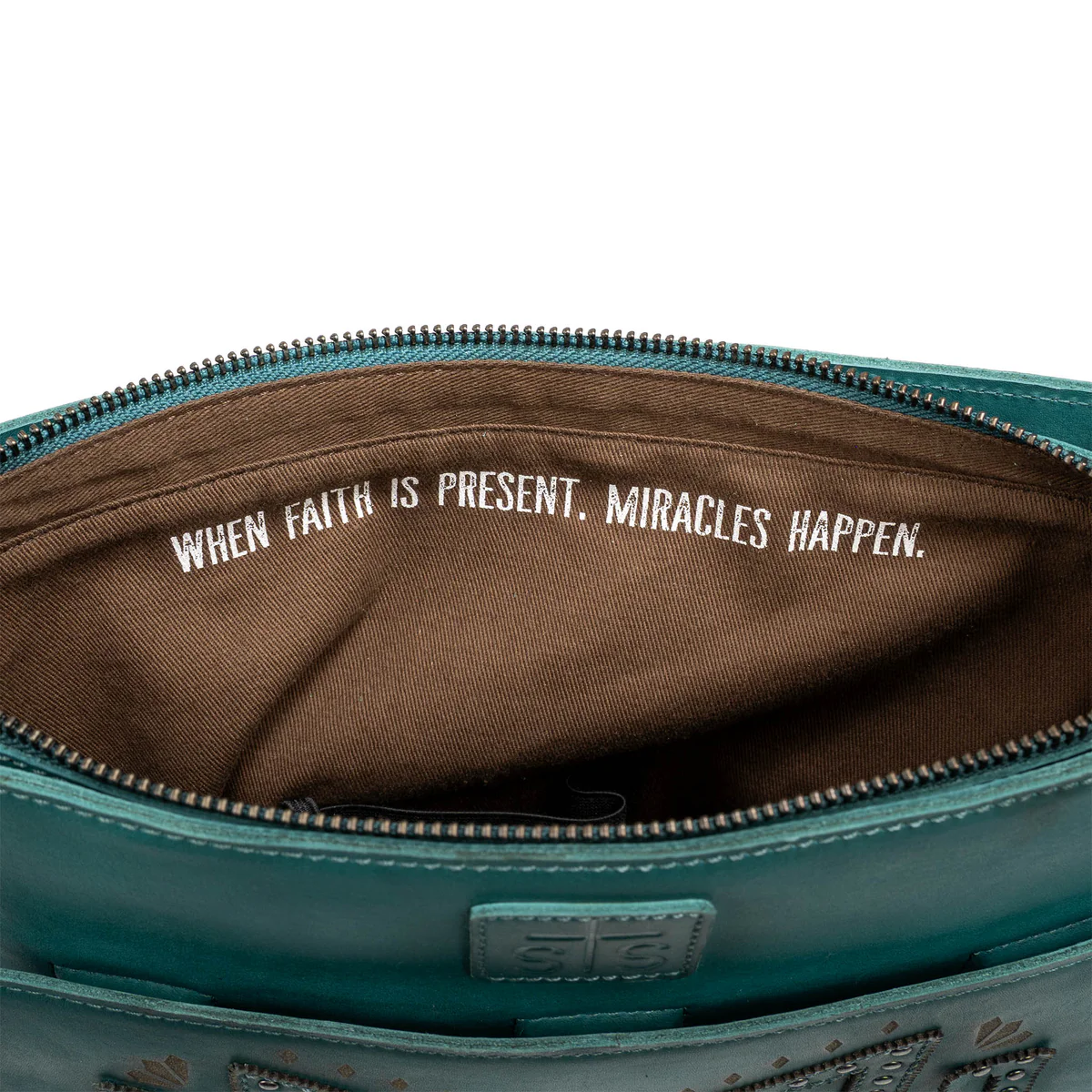Teal bag with brown interior and motivational quote on a white background