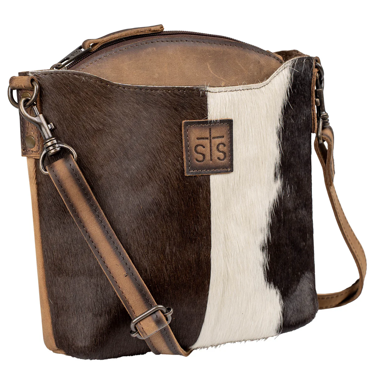 Brown and white cowhide leather bag with a visible brand logo on a white background