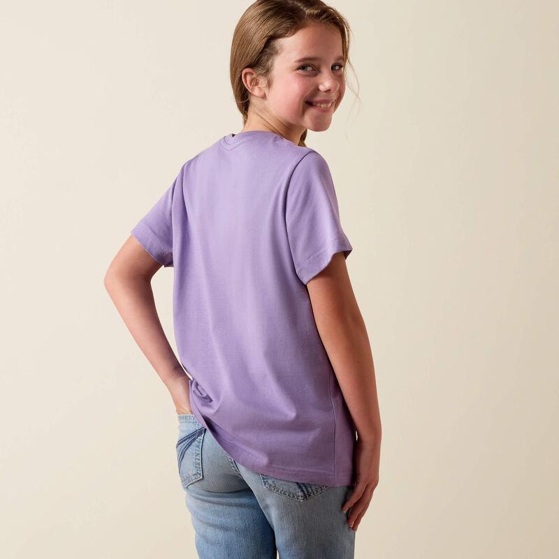 Person wearing a purple t-shirt and blue jeans on a beige background