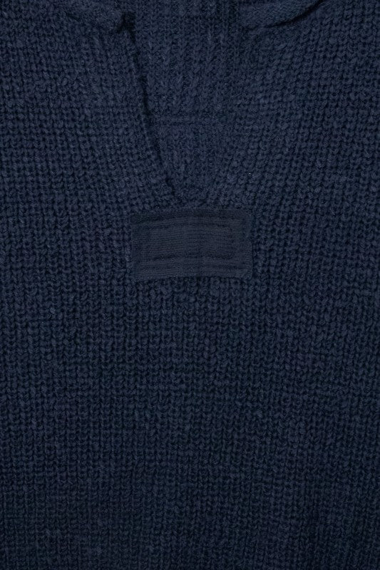 Navy blue textured fabric with a brand label