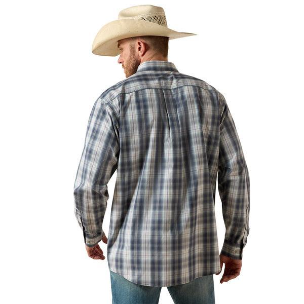 Man wearing a blue plaid shirt. 