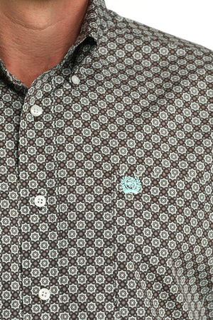 Close-up of a patterned shirt with a floral design on a white background