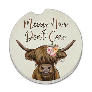Car coaster with a cow illustration and 'Messy Hair Don't Care' text on a beige background