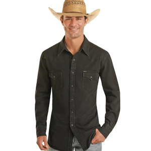 A man wearing a black western long-sleeve snap-down shirt 