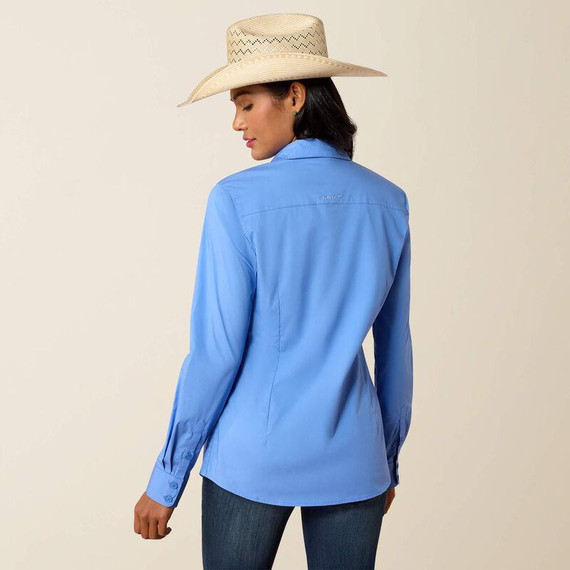 Long sleeve blue button up shirt.