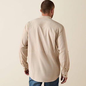 Long sleeve beige btton up shirt.