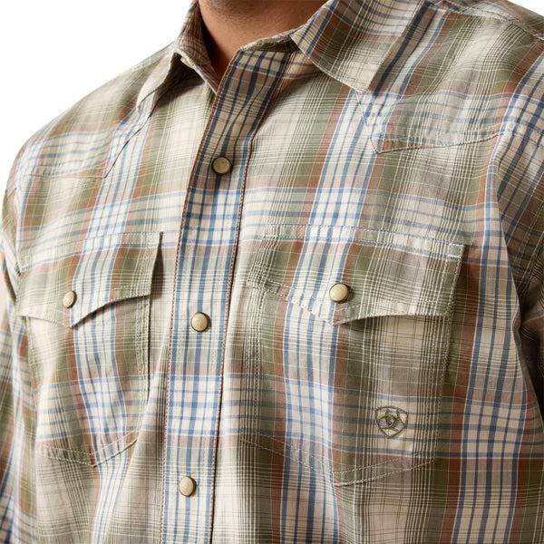 Man wearing a olive green plaid shirt 