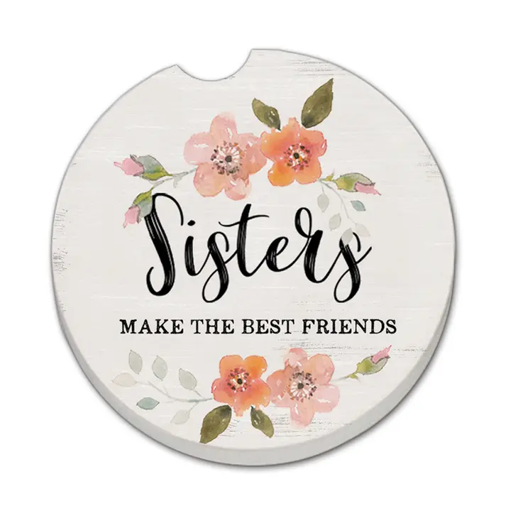 Car coaster with floral design and text 'Sisters make the best friends' on a white background