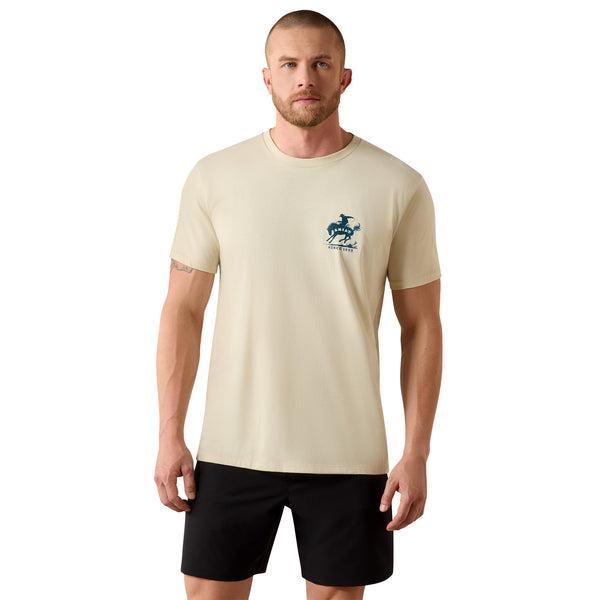 Man wearing a beige t-shirt with a logo on a white background