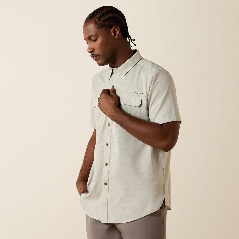 Light-colored, short-sleeve shirt.