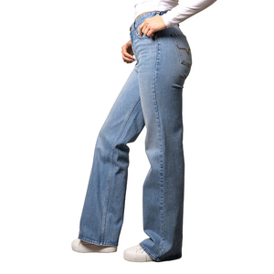 Person wearing blue jeans on a white background