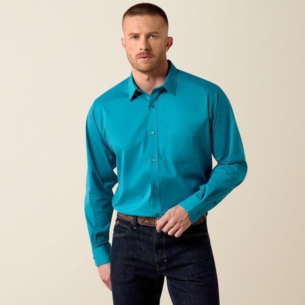 Man wearing a turquoise  shirt 