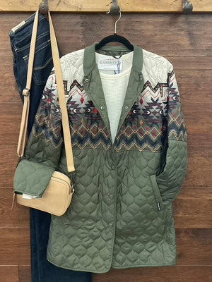 An olive green quilted jacket with a colorful geometric pattern across the chest and upper sleeves  