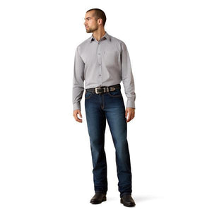 Man wearing a gray dress shirt 