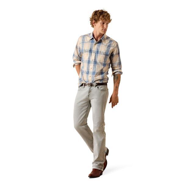 Man wearing a blue plaid shirt 