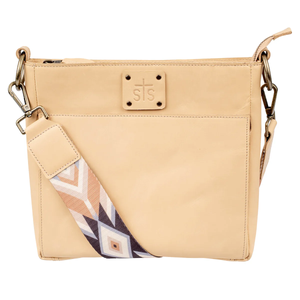 Beige handbag with a patterned strap on a white background