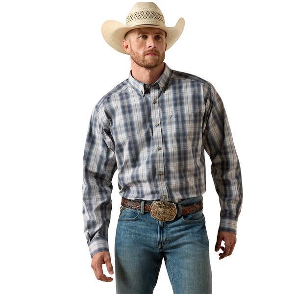Man wearing a blue plaid shirt. 