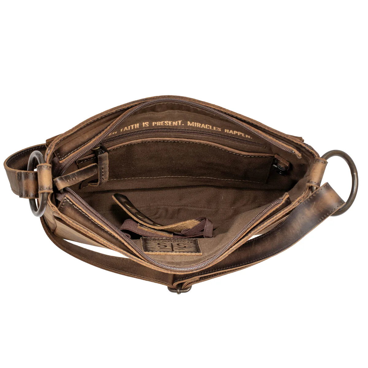 Brown leather bag with visible stitching on a white background