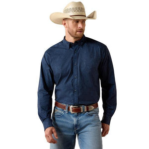 Man wearing a blue patterned shirt 